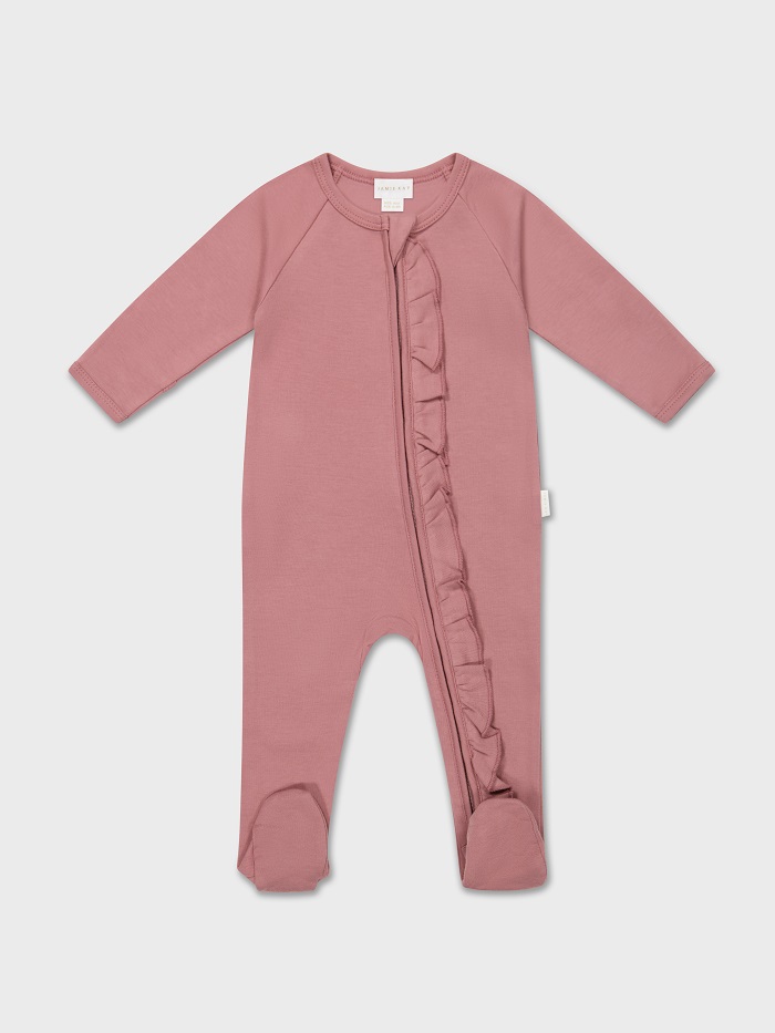 Pink baby ruffle romper flat lay